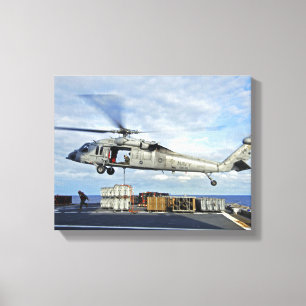 Ein MH-60S Seahawk bereitet vor sich, ammunitio zu Leinwanddruck