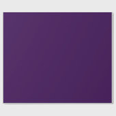 Ein minimalistischer violetter Hintergrund mit dez Geschenkpapier (Flach)