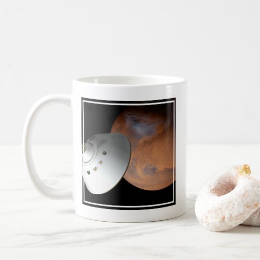 Ein mit Aeroshell angereichertes Raumfahrzeug nähe Kaffeetasse (Mit Donut)