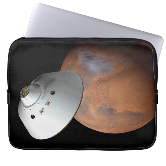 Ein mit Aeroshell angereichertes Raumfahrzeug nähe Laptopschutzhülle (Vorderseite)