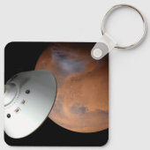 Ein mit Aeroshell angereichertes Raumfahrzeug nähe Schlüsselanhänger (Rückseite)