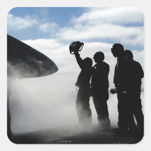 Ein Mitglied der Crew eines Cockpits Quadratischer Aufkleber (Vorderseite)