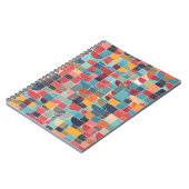 Ein modernes Notebook mit lebhaftem Mosaikdesign Notizblock (Linke Seite)
