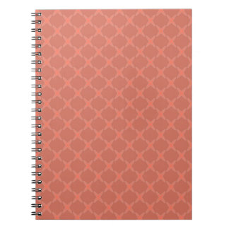 Ein monochromes dunkles oranges kleines geometrisc notizblock