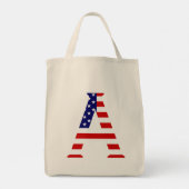 Ein Monogramm überlagert sich auf der US-Flagge-Ka Tragetasche (Rückseite)