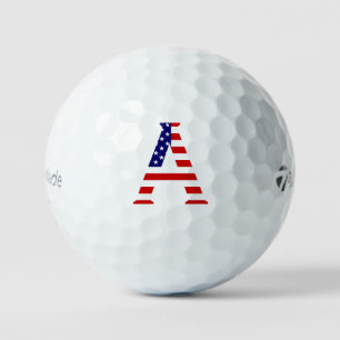 Ein Monogramm überlagert sich auf der US-Flagge tm Golfball