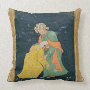 Ein Mulla, der unten zu einem Mann im iranischen Kissen