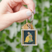 Ein Mulla, der unten zu einem Mann im iranischen Schlüsselanhänger (Hand)