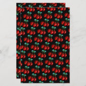 Ein Muster der roten Kirschen auf den Blätter der (Vorne/Hinten)