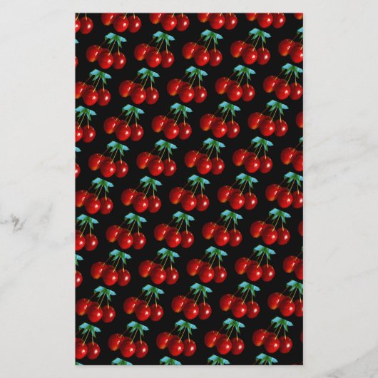 Ein Muster der roten Kirschen auf den Blätter der (Vorderseite)