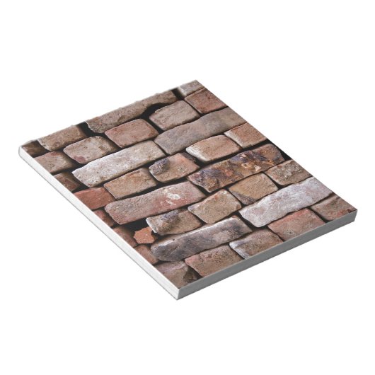 Ein näherer Blick auf eine Ziegelwand Notizblock (angewinkelt)