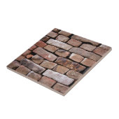 Ein naherer Blick zu einer Ziegelsteinwand Fliese (Seite)