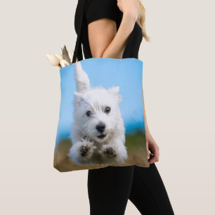 Ein niedlicher Westhochland-Terrier-Welpen-Betrieb Tasche