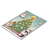 ein Notizbuch mit Weihnachtsbaum und lustigem Char Notizblock (Linke Seite)