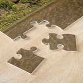 Ein Nutzfeld vor Strohdächern Puzzle (Seite)