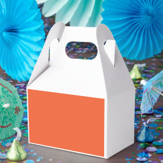 ein orangefarbener Hintergrund Geschenkschachtel