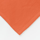 ein orangefarbener Hintergrund mit schwarzer Grenz Fleecedecke (Ecke)