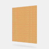 ein orangefarbener weißer Hintergrund mit kleinen  Acrylschild (Winkel)