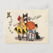 Ein paar Kinder mit geschnitztem Kürbis, Halloween Postkarte (Vorderseite)