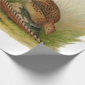 Ein Paar Ring mit halshaltigem Fasan in einem Gras Geschenkpapier (Ecke)