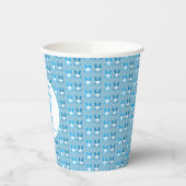 Ein paar Sonnenstrahlen drehen sich einen Geburtst Pappbecher (Links)