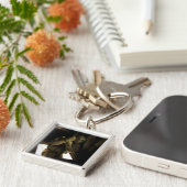 Ein Parareskuemer der US-Luftwaffe beginnt seinen Schlüsselanhänger (Seite)