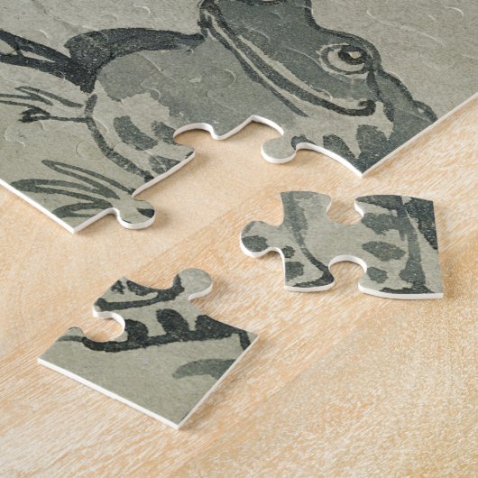 Ein Pelikan und ein Frosch im Gespräch (w/c auf Puzzle (Seite)