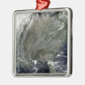 Ein pinradähnliches Muster von Hochdruckwolken Silbernes Ornament (Links)