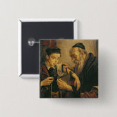 Ein Rabbiner, der die Gebetsriemen am Arm eines Button (Vorne & Hinten)