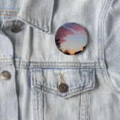 ein rosa, blauer und lila Sonnenaufgang Button (Beispiel)