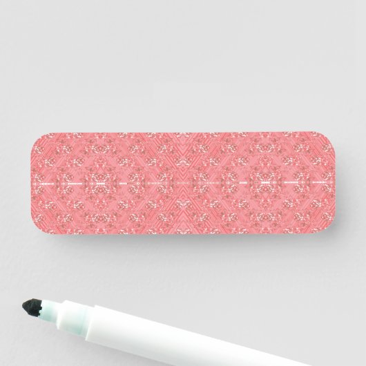 ein rosa Hintergrund mit einem Muster in der Mitte Namensschild (Beispiel)