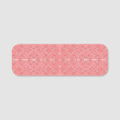 ein rosa Hintergrund mit einem Muster in der Mitte Namensschild (Vorderseite)