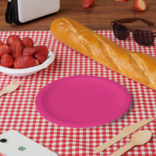 ein rosa Hintergrund mit einem schwarzen Rand Pappteller