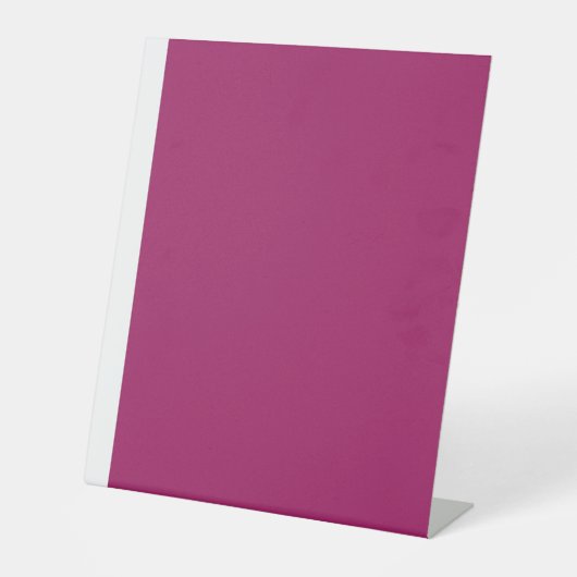 ein rosa Hintergrund mit weißem Rand Sockelschild (Vorderseite)