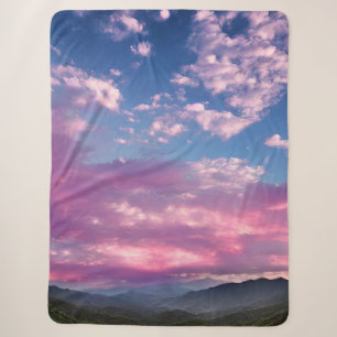 Ein rosa leuchtender Sonnenaufgang Sherpadecke