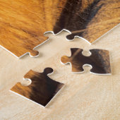 Ein rot gekleideter Löwe, der sich die Kamera ansc Puzzle (Seite)