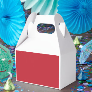 ein roter Hintergrund mit Geschenkschachtel