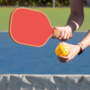 ein roter Hintergrund mit weißem Rand Pickleball Schläger