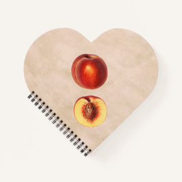 Ein roter Pfirsich und anderthalb Notizblock
