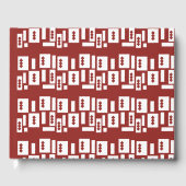 Ein roter Teppich mit einem textilen Muster wird a Gästebuch (Vorderseite)