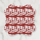 Ein roter Teppich mit einem textilen Muster wird a Geschenkanhänger (Rückseite)