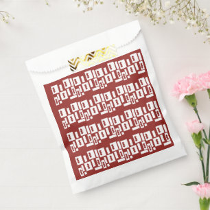 Ein roter Teppich mit einem textilen Muster wird a Geschenktütchen