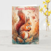 Ein Rotes Eichhörnchen, das eine Nuss isst Karte (Gelbe Blume)