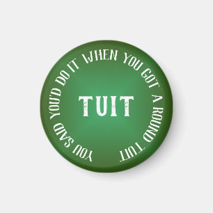 Ein runder Tuit mit Humorgrünem Licht Magnet