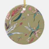 Ein rundes Ornament zeigt ein Blumenmuster  (Vorne)