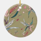 Ein rundes Ornament zeigt ein Blumenmuster  (Hinten)