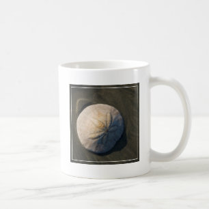 Ein Sand-Dollar auf dem Strand Kaffeetasse
