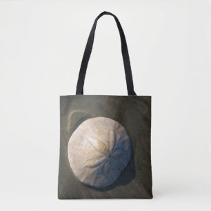 Ein Sand-Dollar auf dem Strand Tasche