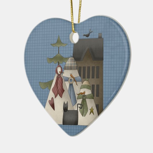 Ein Schnee-Keramik Weihnachtsschmuck (Links)