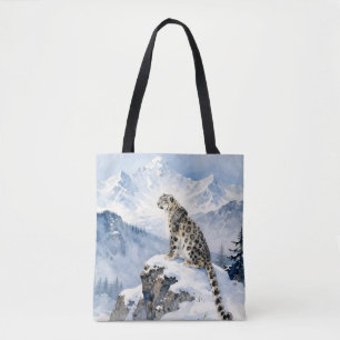 Ein Schneeleopard auf schneebedecktem Gipfel Tasche